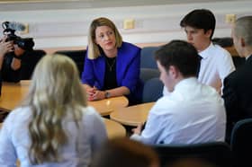 Education Secretary Jenny Gilruth chats to pupils during a visit to Craigmount High School in Edinburgh to mark SQA Results Day 2023. Andrew Milligan/PA Wire