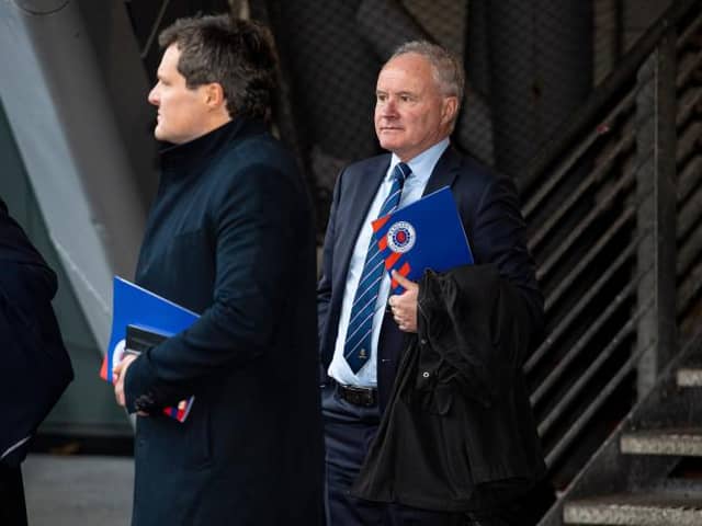 Rangers vice-chairman John Bennett (right) is pictured leaving the Ibrox club's AGM on Tuesday. (Photo by Ross MacDonald / SNS Group)