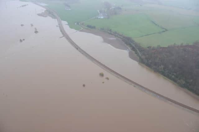 The flooded River Don between Kintore and Dyce on Saturday, downstream from the search at Monymusk.. Picture: Network Rail Scotland