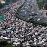 Vehicles are seen stuck in bumper to bumper traffic on the Delhi-Jaipur expressway in Gurgaon, on April 25, 2023. - India will overtake China as the world's most populous country in the coming week, hitting almost 1.43 billion people, the United Nations said on April 24. (Photo by Vinay GUPTA / AFP) (Photo by VINAY GUPTA/AFP via Getty Images)