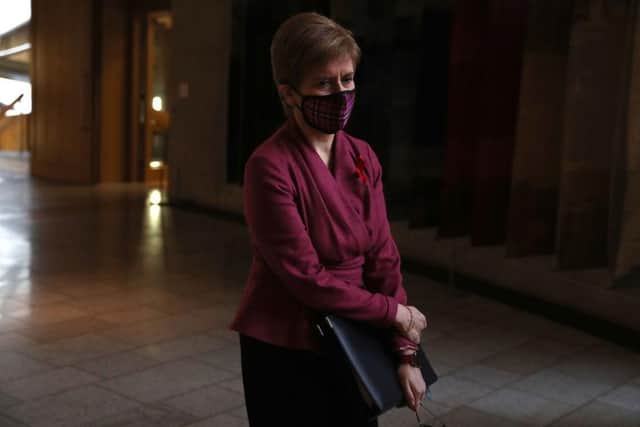 Scotland has reached a grim milestone in its struggle with coronavirus, as First Minister Nicola Sturgeon confirmed that deaths from Covid-19 have now surpassed 4,000.  (Photo by Andrew MIlligan - WPA Pool/Getty Images)