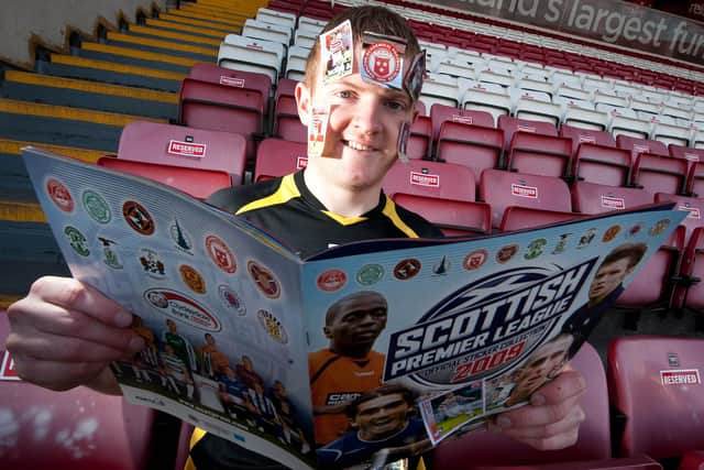 Brian Easton of Hamilton promotes the 2009 SPL Panini sticker album