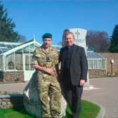 Very Rev Dr John Chalmers with his son, JJ Chalmers.