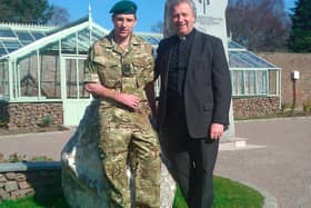 Very Rev Dr John Chalmers with his son, JJ Chalmers.