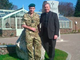 Very Rev Dr John Chalmers with his son, JJ Chalmers.