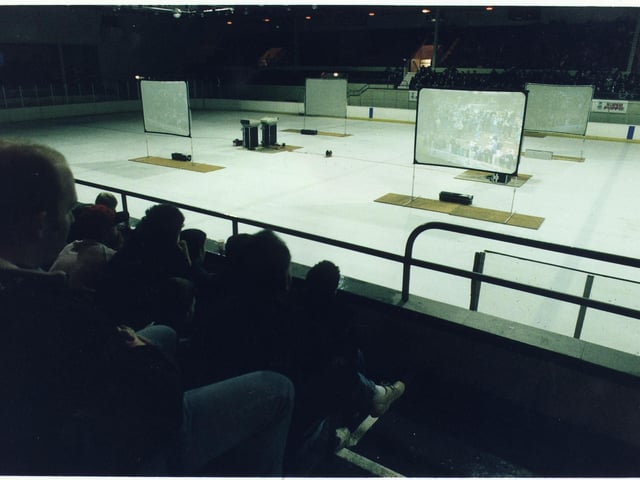 Hibs fans gathered to watch a Scottish Cup tie against Stenhousemuir on screens at Murrayfield Ice Rink on 3rd March 1995.