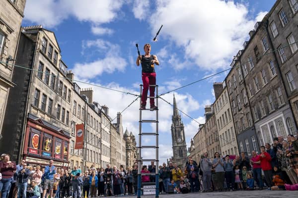 Street performers entertain the crowds on Edinburgh's Royal Mile during this year's Fringe. Picture: Jane Barlow/PA Wire