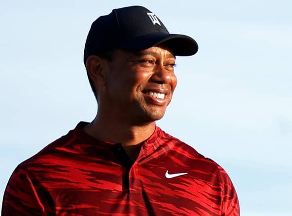 Tiger Woods will return to competitive golf at next week's PNC Championship. (Photo by Mike Ehrmann/Getty Images)