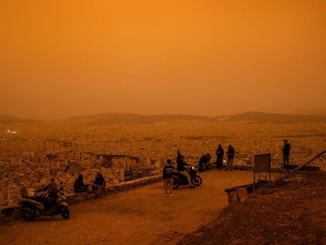 The view from Tourkovounia hill, overlooking the city of Athens, was limited due to the dust storm.