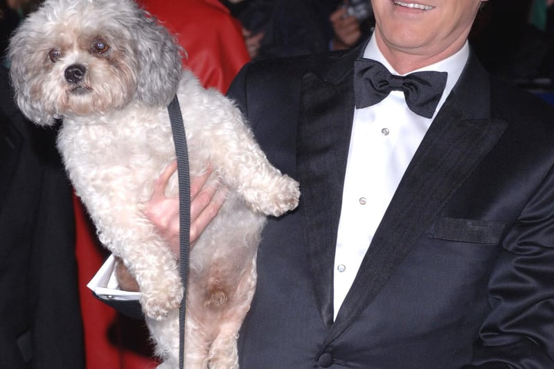 Paul O'Grady and his dog Buster arriving for the National Television Awards 2005 (NTA), at the Royal Albert Hall, central London.