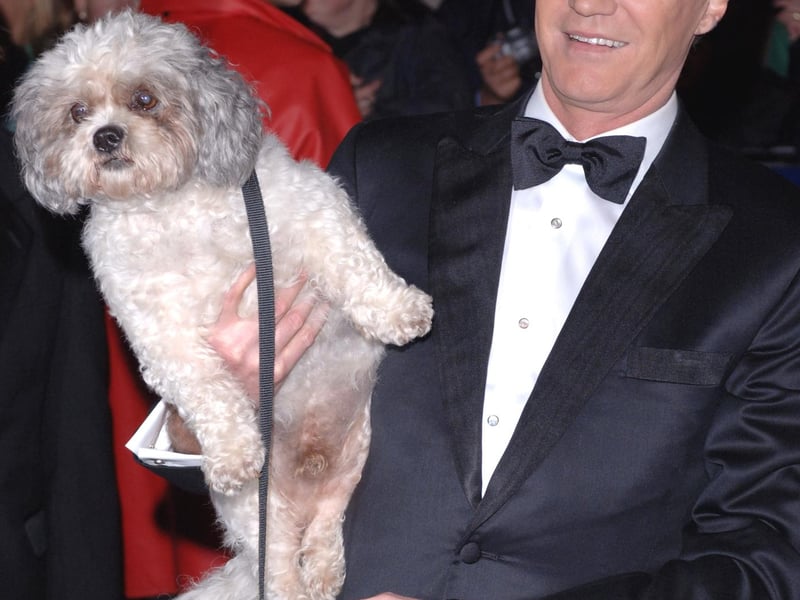 Paul O'Grady and his dog Buster arriving for the National Television Awards 2005 (NTA), at the Royal Albert Hall, central London.