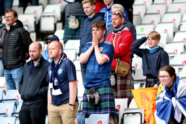 Fans look dejected after Scotland's Euros loss to the Czech Republic at Hampden Park (Picture: Robert Perry/Getty Images)