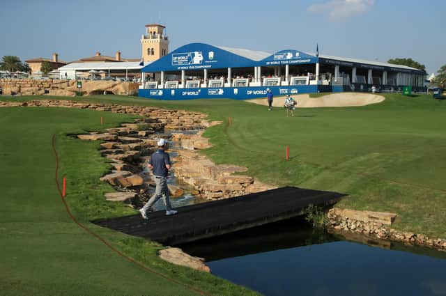 Bob MacIntyre crosses the bridge on the 18th hole during day one of the DP World Tour Championship at Jumeirah Golf Estates. Picture: Andrew Redington/Getty Images