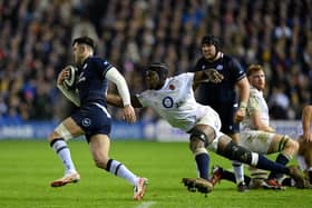 Blair Kinghorn runs with the ball as Maro Itoje attempts a tackle during February's Six Nations match between Scotland and England - but should England find an alternative to the National Anthem when the teams face each other next year? (Picture: Stu Forster/Getty Images)
