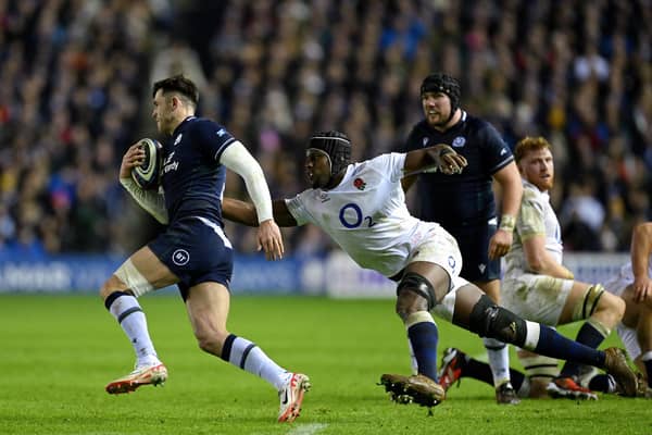 Blair Kinghorn runs with the ball as Maro Itoje attempts a tackle during February's Six Nations match between Scotland and England - but should England find an alternative to the National Anthem when the teams face each other next year? (Picture: Stu Forster/Getty Images)