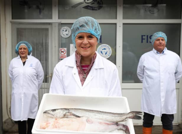 First Minister of Scotland and leader of the SNP Nicola Sturgeon, visits J Charles fish merchants in Aberdeen during campaigning for the Scottish Parliamentary election.