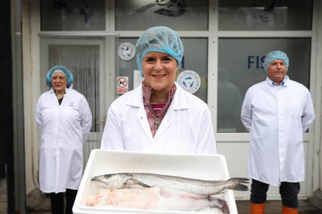 First Minister of Scotland and leader of the SNP Nicola Sturgeon, visits J Charles fish merchants in Aberdeen during campaigning for the Scottish Parliamentary election.