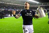 Stuart Hogg celebrates with the Calcutta Cup during a Guinness Six Nations match between Scotland and England at BT Murrayfield.
