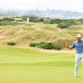 Grant Forrest waves to the crowd on the 18th green after shooting 62 in the third round of the Hero Open at Fairmont St Andrews. Picture: Andrew Redington/Getty Images.