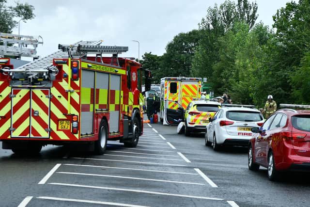 All three emergency services at the scene in New Carron Road, Falkirk on Saturday evening. Pic:  Michael Gillen