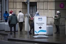 Vaccine centres in Lothian are costing the NHS £9m.