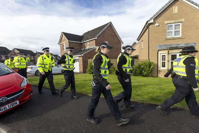 Officers from Police Scotland outside the home of former chief executive of the Scottish National Party (SNP) Peter Murrell, in Uddingston, Glasgow. Picture: Robert Perry/PA Wire