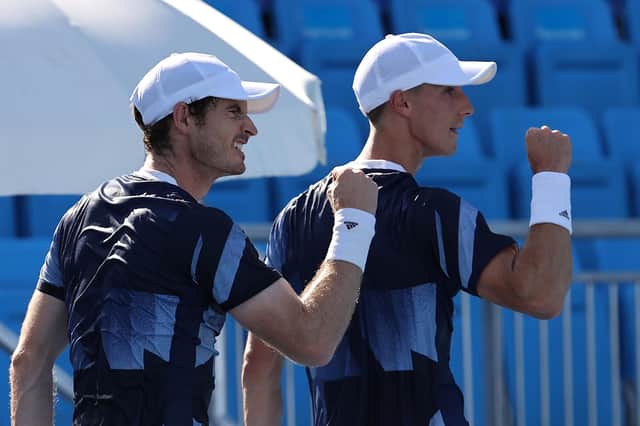 Andy Murray and Joe Salisbury celebrate winning a point against Tim Putz and Kevin Krawietz