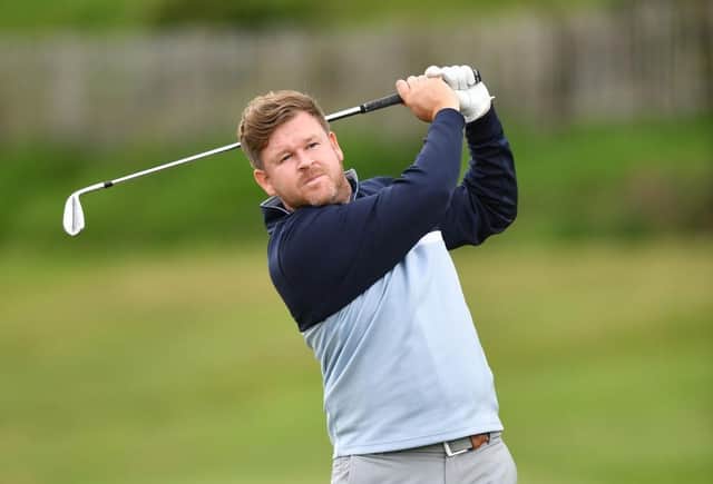 Paul O'Hara plays his second shot at the 18th hole during day one of the Loch Lomond Whiskies' Scottish PGA Championship at West Kilbride. Picture: Mark Runnacles/Getty Images.