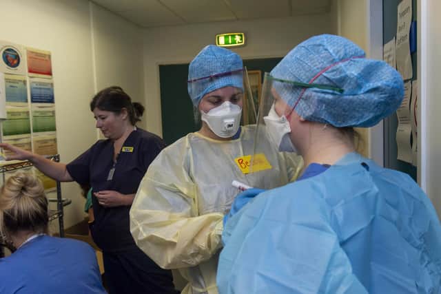 Thursday 9th of April 2020: A first look inside the Royal Infirmary of Edinburgh hospital as they prepare for patients with the Covid-19 Coronavirus.
Doctors and nurses prepare to enter the Covid ward putting on the PPE safety equipment