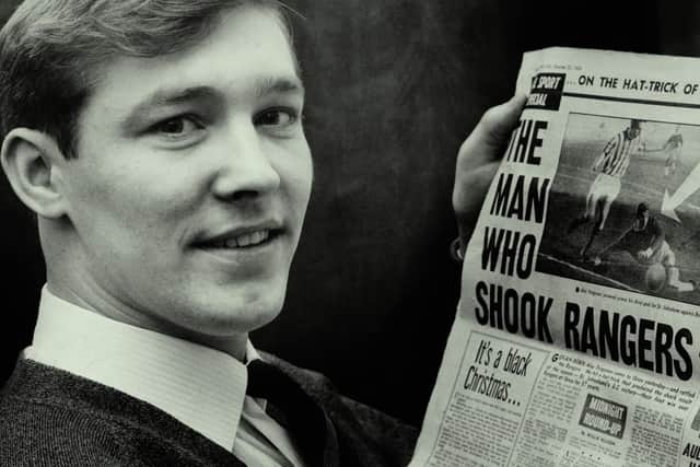Alex Ferguson with a newspaper report of his famous hat-trick for St Johnstone against Rangers in 1963.
