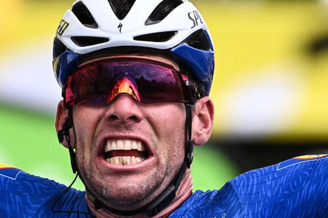 Stage winner Team Deceuninck Quickstep's Mark Cavendish of Great Britain celebrates as he crosses the finish line of the 4th stage of the 108th edition of the Tour de France cycling race, 150 km between Redon and Fougeres, on June 29, 2021.(Photo by ANNE-CHRISTINE POUJOULAT/AFP via Getty Images)