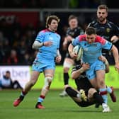 Duncan Weir of Glasgow Warriors is tackled by JJ Hanrahan of Dragons. Photo by Ashley Crowden/INPHO/Shutterstock (13745043cs)