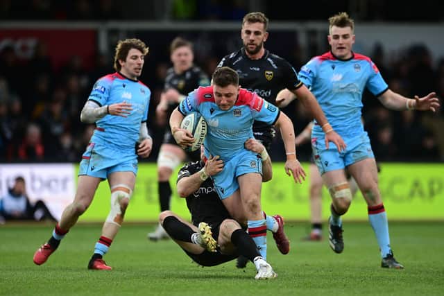 Duncan Weir of Glasgow Warriors is tackled by JJ Hanrahan of Dragons. Photo by Ashley Crowden/INPHO/Shutterstock (13745043cs)