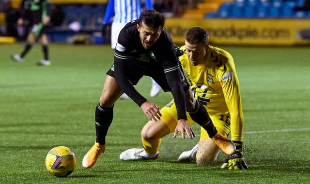 Celtic striker Albian Ajeti goes down under the attentions of Colin Doyle. Picture: SNS