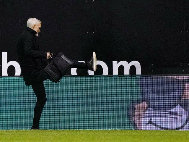 This picture of Jim Goodwin leaving Easter Road just after being sacked as Aberdeen boss was all the rage.