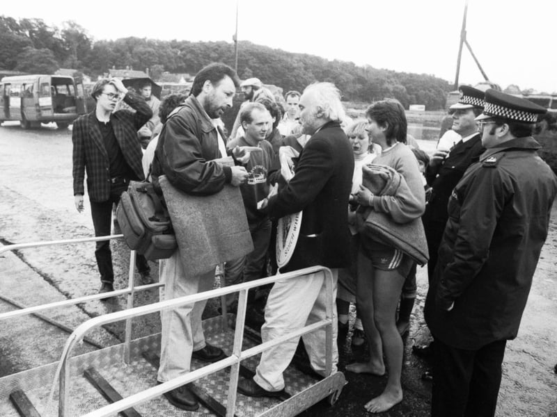 The Maid of the Forth ferry took theatre-goers to Inchcolm island in the Firth of Forth for a special production of Macbeth during Edinburgh Festival 1989. Picture shows disappointed customers with organiser Richard Demarco after the ferry was overbooked.