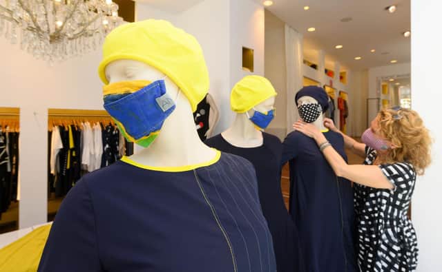 Retailers have been hit hard in the lockdown although this fashion store in Ludwigsburg, southern Germany, is preparing to sell a newly popular item of clothing as Germany relaxes its restrictions (Picture: Thomas Kienzle/AFP via Getty Images)