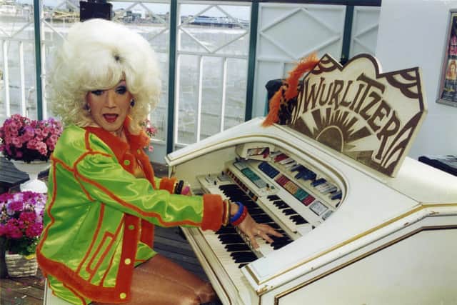 Paul O'Grady as Lily Savage at the Wurlitzer on North Pier in 1996