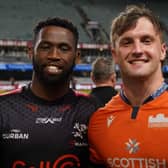 Ben Muncaster, right, got to chat to Siya Kolisi after Edinburgh's stunning win over Sharks. Picture: Joe Paolella