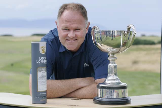 Alastair Forsyth shows off the trophy after winning the Loch Lomond Whiskies Scottish PGA Championship at West Kilbride. Picture: Steve Welsh/Getty Images.