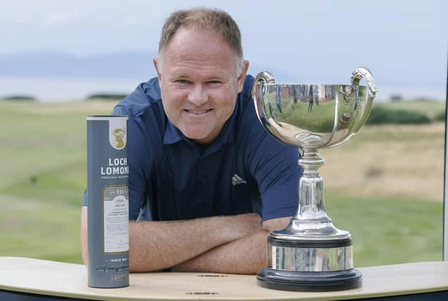 Alastair Forsyth shows off the trophy after winning the Loch Lomond Whiskies Scottish PGA Championship at West Kilbride. Picture: Steve Welsh/Getty Images.