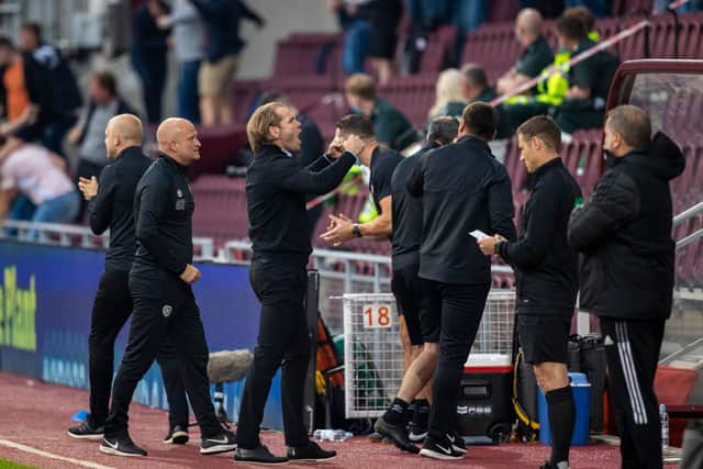 Robbie Neilson celebrates after Hearts' late winner against Celtic.