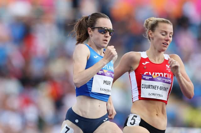 Laura Muir has her hands on a Commonwealth Games medal.