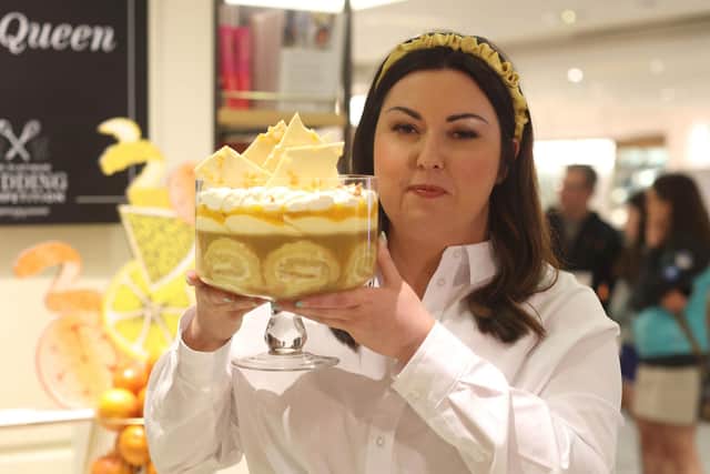 Jemma Melvin with her lemon Swiss roll and amaretti trifle which beat 5,000 desserts to become the official pudding of the Queen's Jubilee celebrations (Picture: James Manning/PA)
