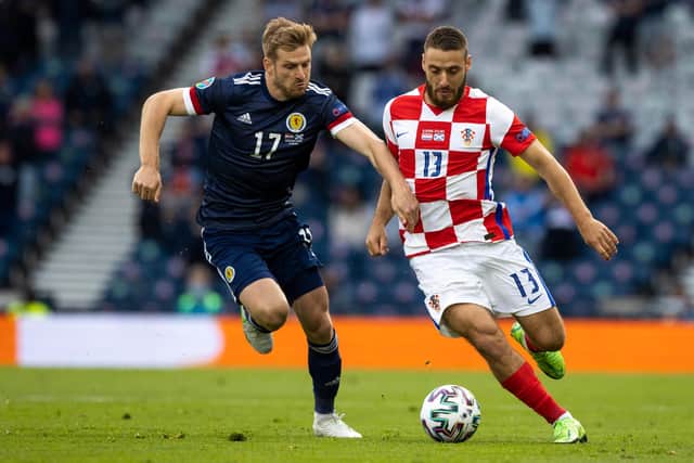 Scotland's Stuart Armstrong battles with Nikola Vlasic of Croatia.