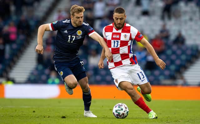 Scotland's Stuart Armstrong battles with Nikola Vlasic of Croatia.