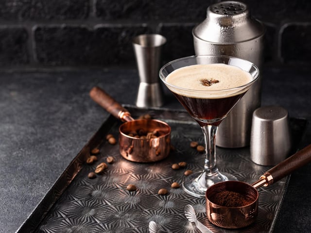 Joint top of the list is the trendy Espresso Martini. Just pop 1 tbsp of sugar syrup, ice, 100ml of vodka, 50ml freshly brewed espresso coffee, and 50ml coffee liqueur into a cocktail shaker, give it a good shake, pour into a martini glass and garnish with four coffee beans.