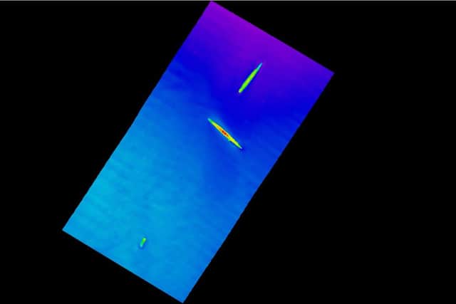 New analysis of the wrecks in the Firth of Forth has  identified the missing 18-metre section of the K-4 submarine (bottom). The wreck of the K-17 is in the middle of the image with the rest of the K-4 pictured at the top. PIC: Wessex Archaeology.