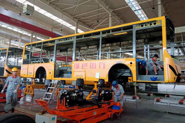 An electric bus production line in a factory in Liaocheng in China's eastern Shandong province (Picture; STR/AFP via Getty Images)