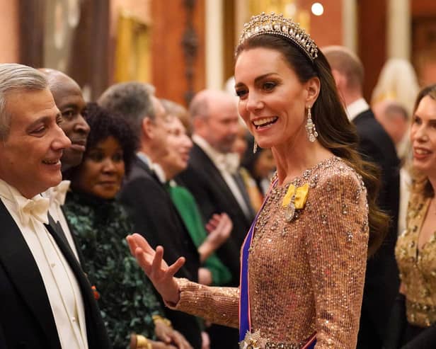 The Princess of Wales meets with guests during a reception for members of the Diplomatic Corps at Buckingham Palace, in London, on December 5. Photo: JONATHAN BRADY/POOL/AFP via Getty Images